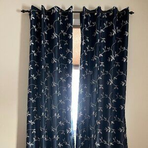 Navy drapes white embroidery